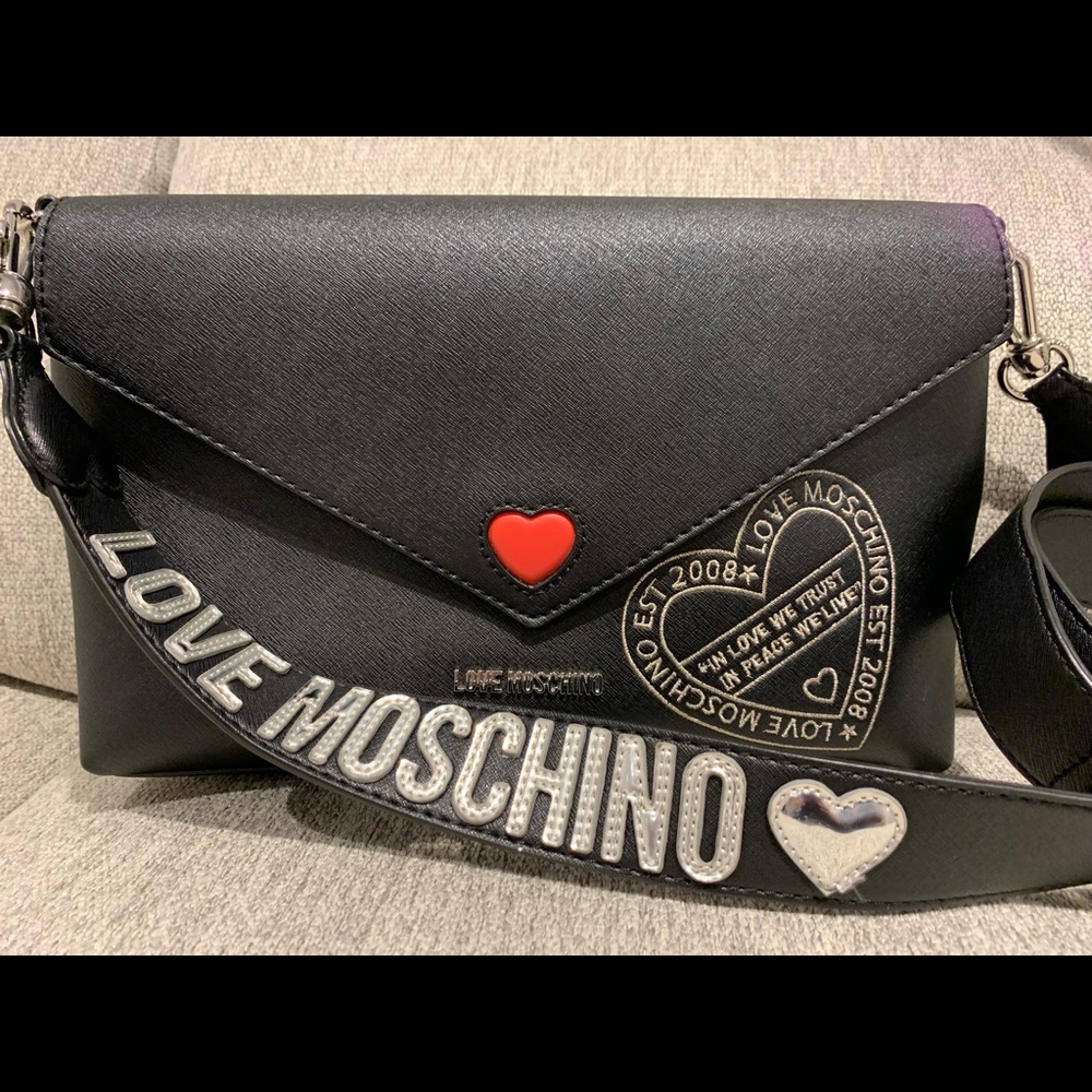 Black ,red ,silver accent Love Moschino shoulder bag.Bag.size 13.5x 8 in